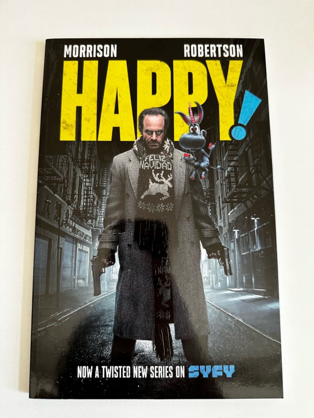 HAPPY! Graphic Novel Cover - Black, Yellow, Blue